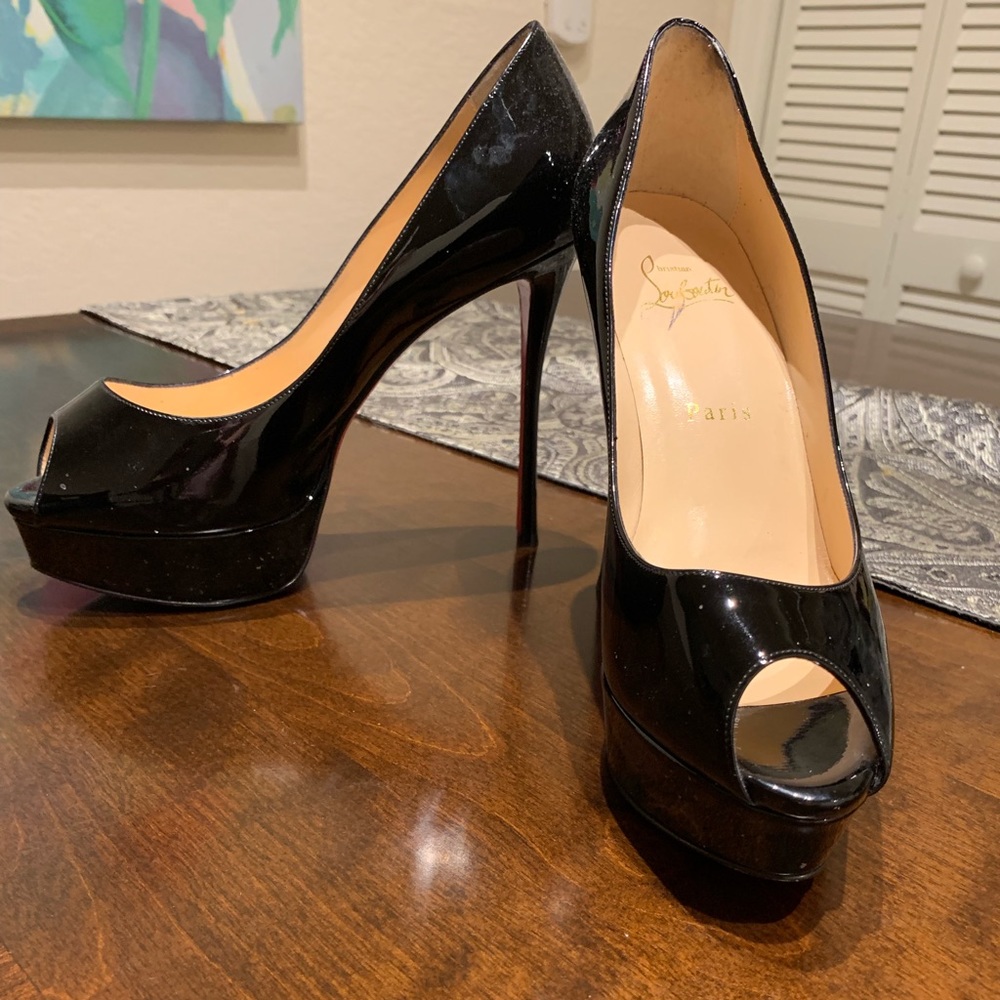 Size 38.5 Christian Loubouton pumps. Worn one time